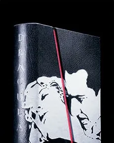 A black box for Dracula with a white face design and a red line