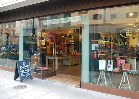 The Shepherds shop front in Gillingham Street with the press-mark sign