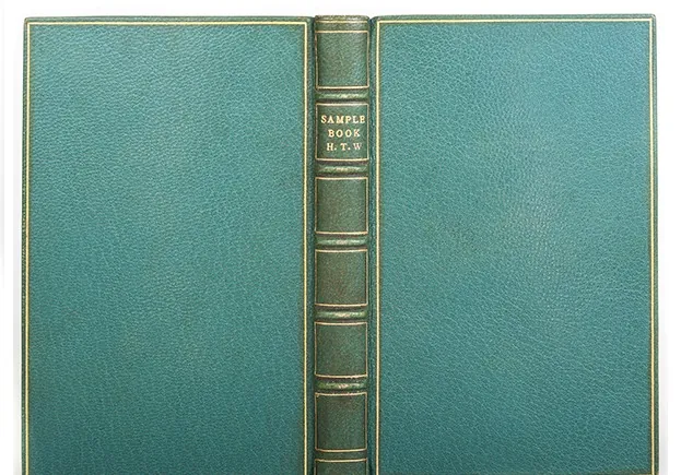 Sample book in full leather with one line gilt panels on the boards and spine